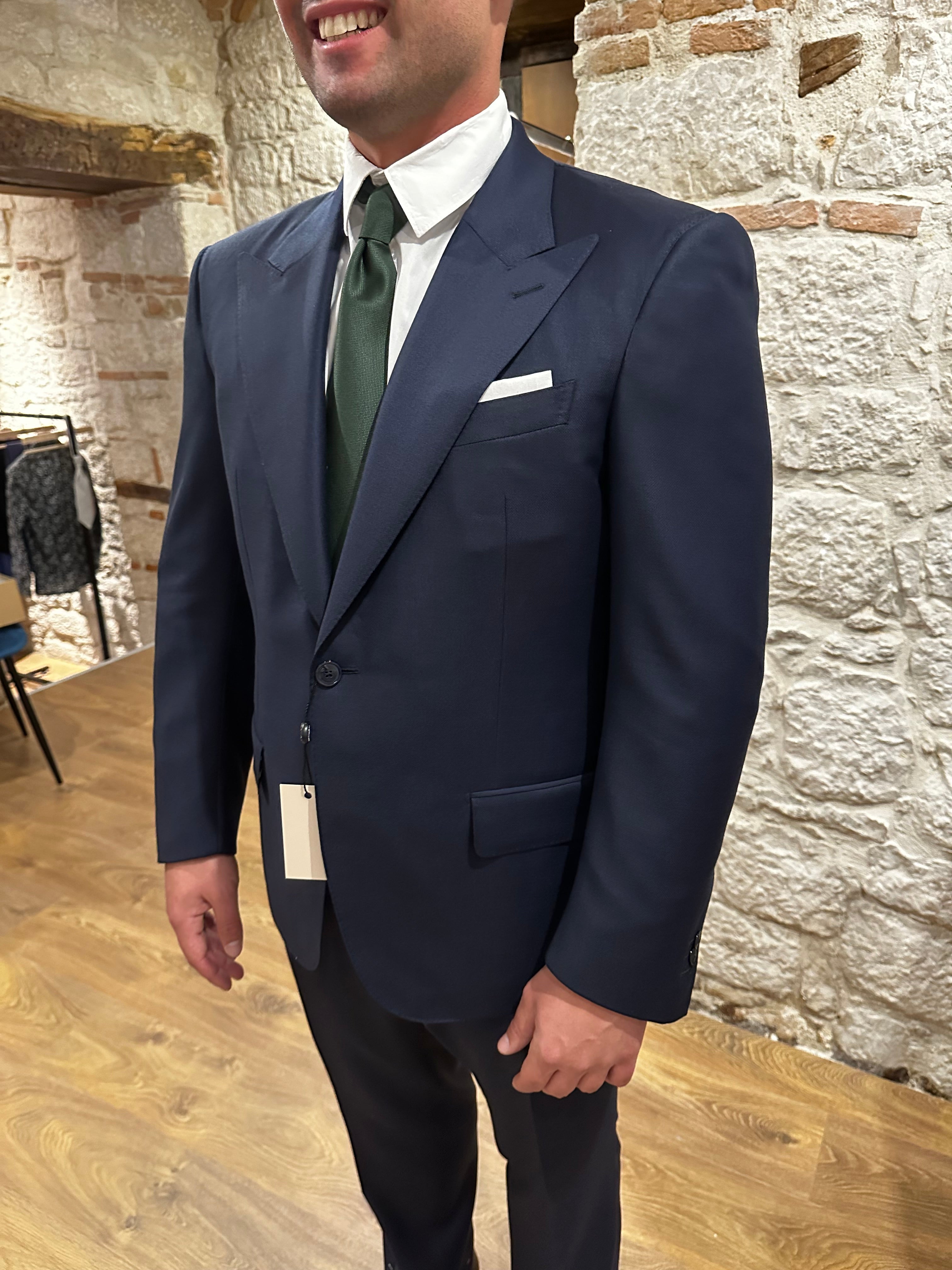 blue-navy-tailored-suit-with-a-green-bespoke-tie-and-a-tailored-white-shirt
