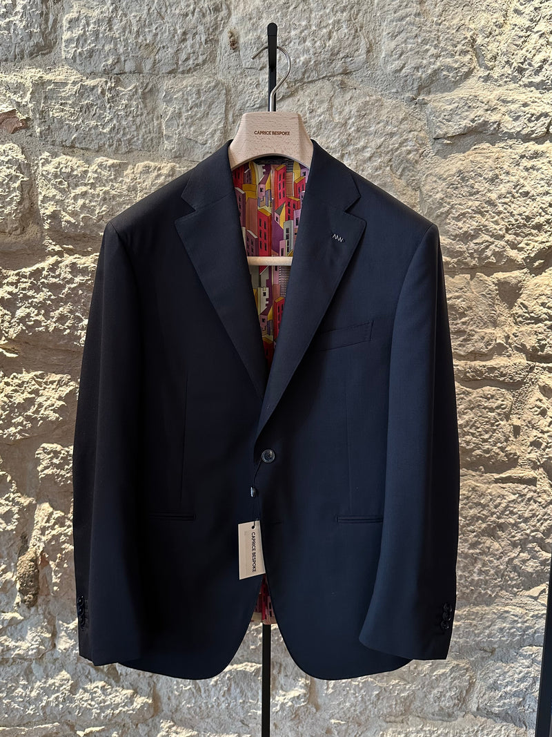 navy-blue-bespoke-blazer-on-a-hanger-with-silk-house-shaped-lining