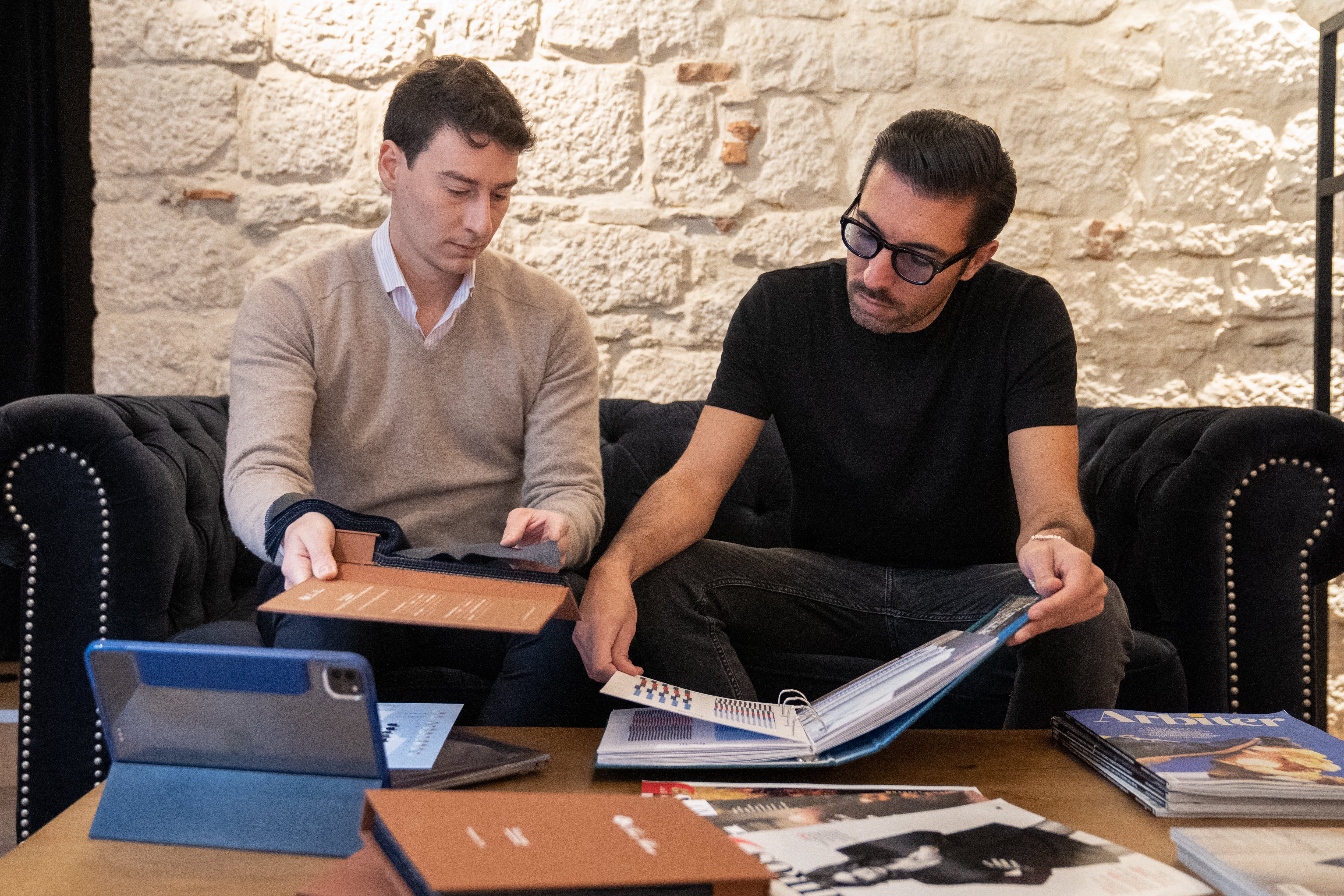 future-groom-being-advised-by-a-personal-stylist-on-personalized-wedding-accessories